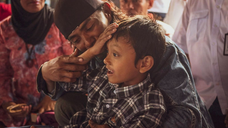 Rizky, Indonesian boy and his father