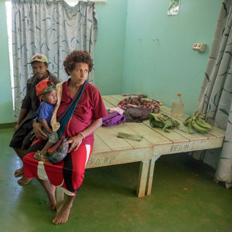 Papua New Guinea family waiting