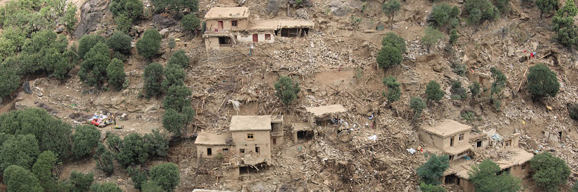 Houses on a mountainside have been destroyed