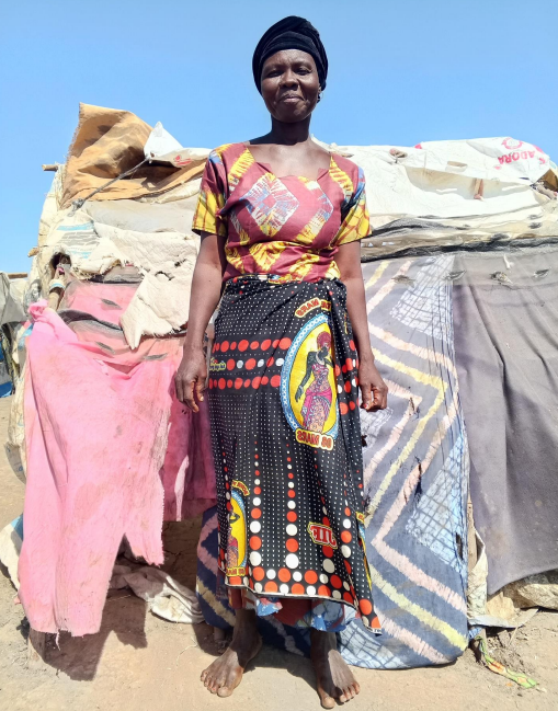 Negeum Alice in front of her tent at the Sokolo disaster relief site